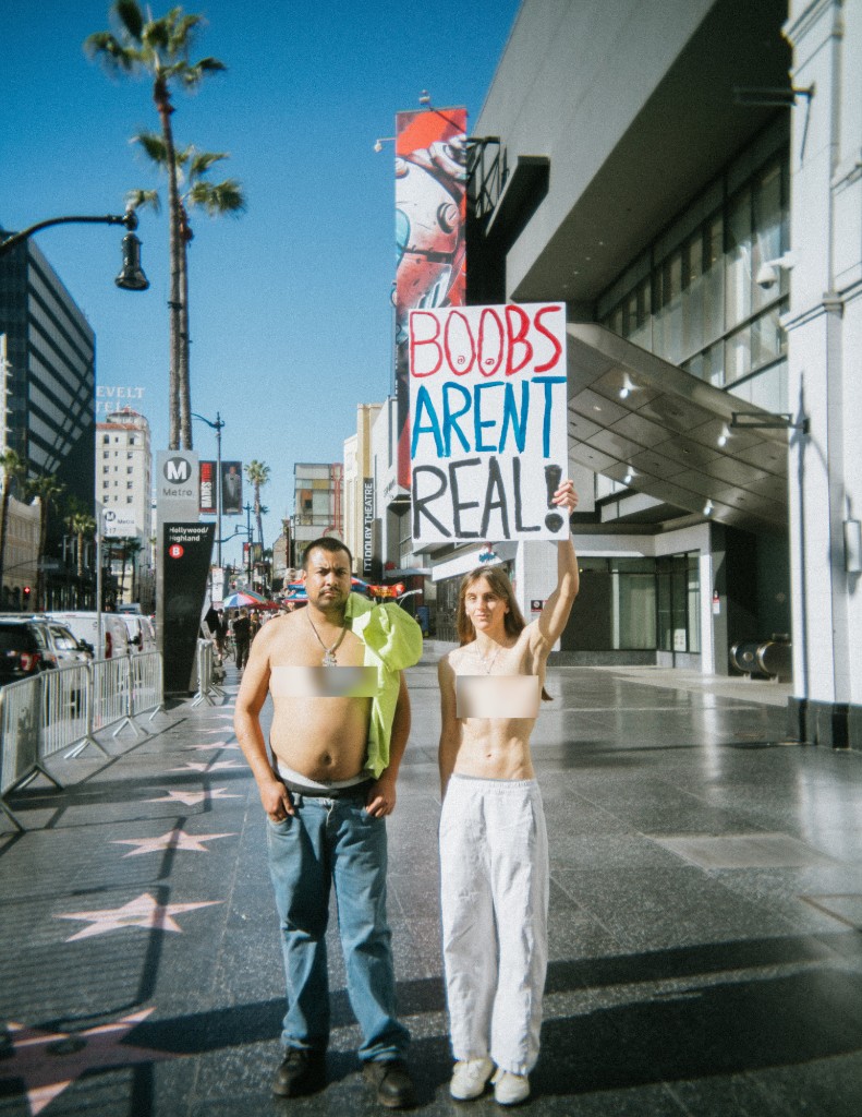 Two people standing together for body equality